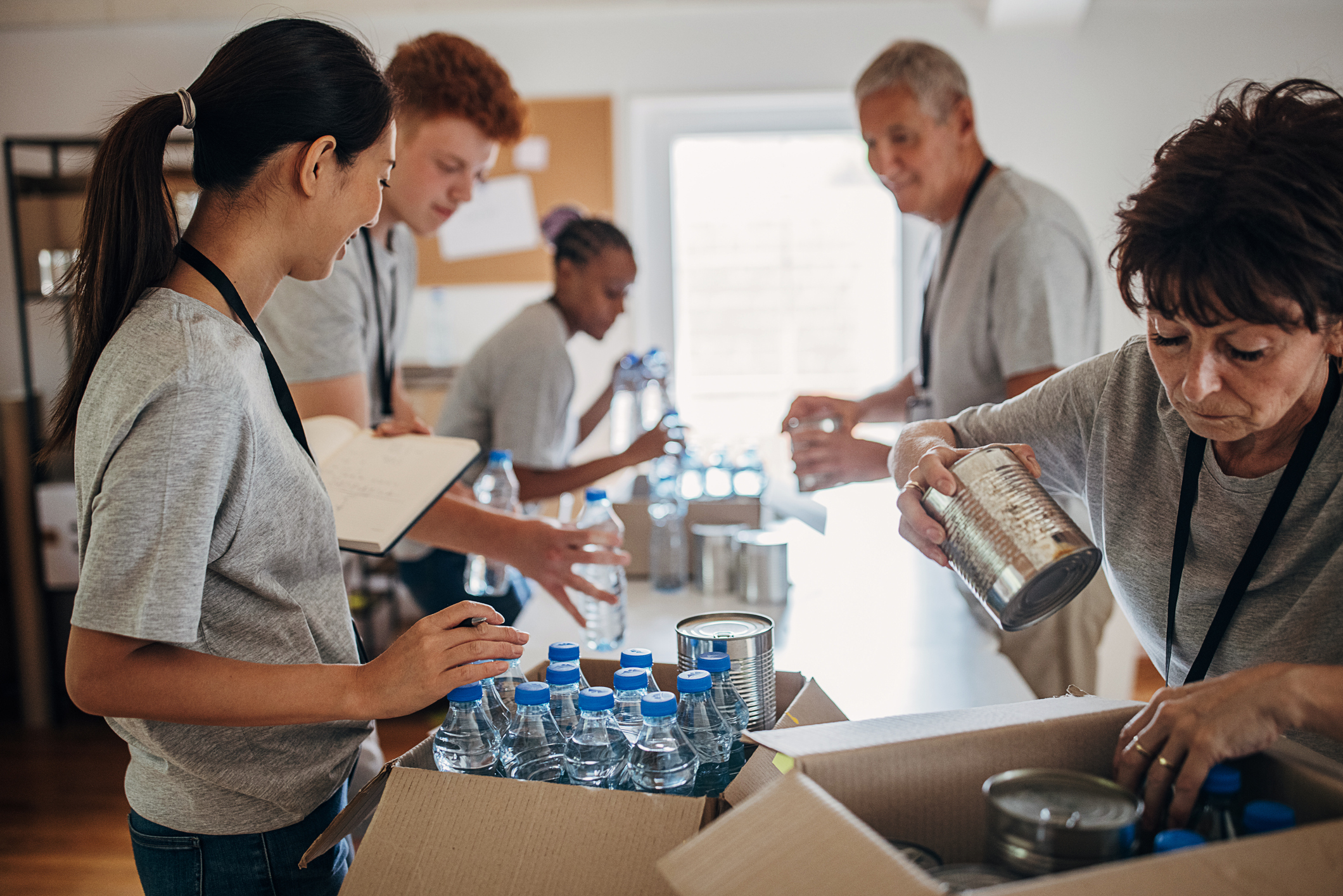 People sorting donations together